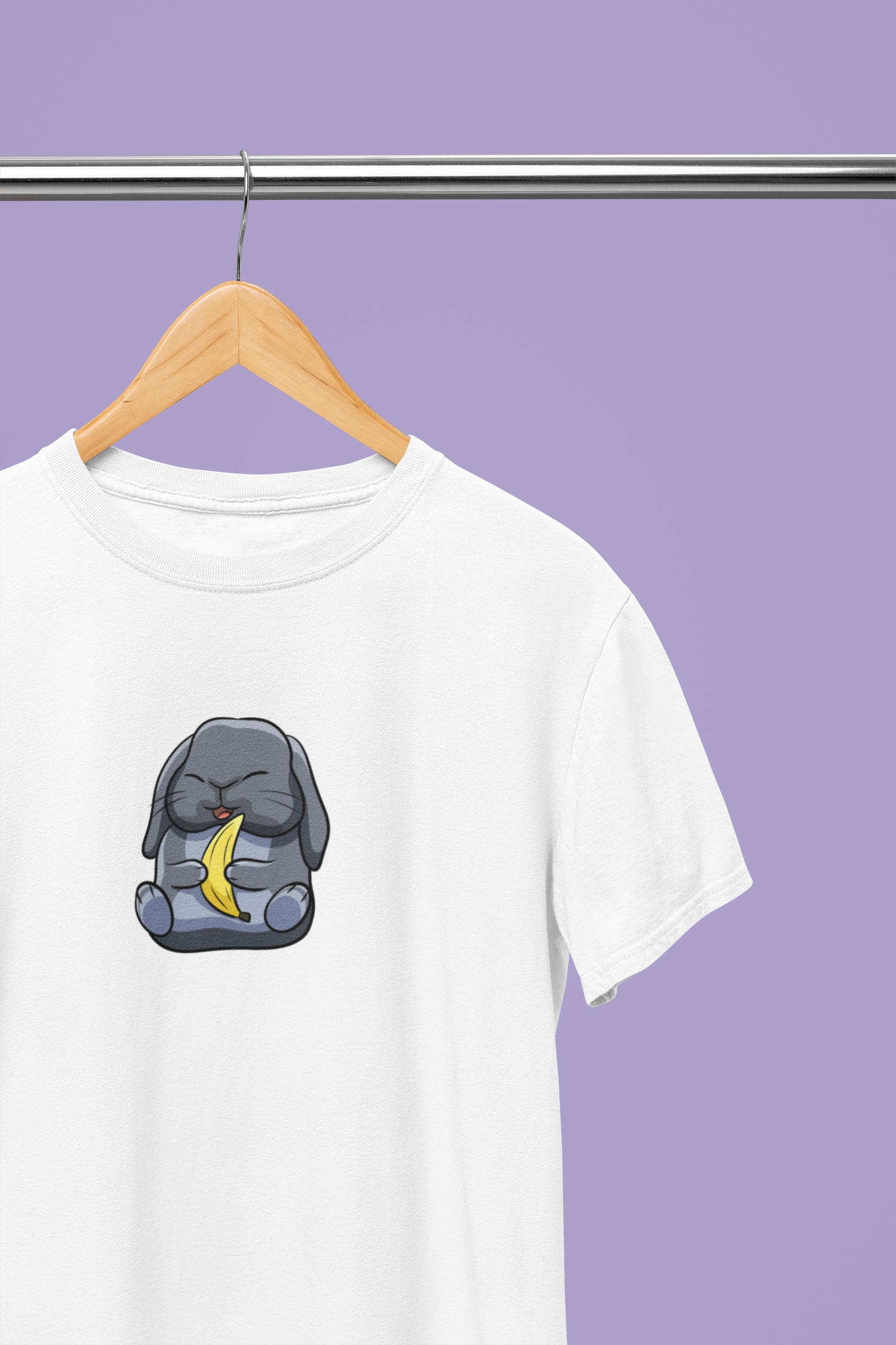 Heavyweight Unisex Crewneck T-shirt in white with a cute cartoon bunny holding a banana printed on the front of the t-shirt